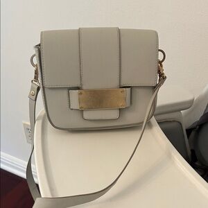 H&M Stylish Beige Crossbody Bag with Gold Accents